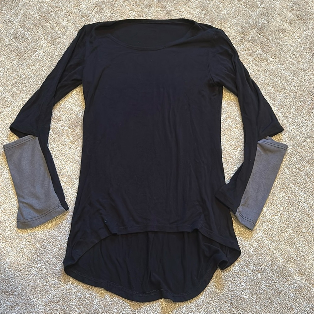 Looks great on! Makes a simple black shirt different. Can be worn with lots